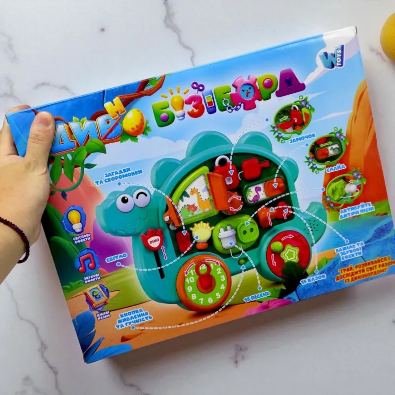 Бізіборд "WToys", ОЗВУЧУВАННЯ УКРАЇНСЬКОЮ МОВОЮ, казки, пісні, звуки, підсвічування, аналоговий годинник, пальчикові ігри, в коробці